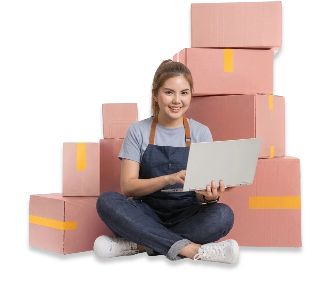 Entrepreneur managing orders from a laptop, surrounded by packed parcels ready for courier dispatch